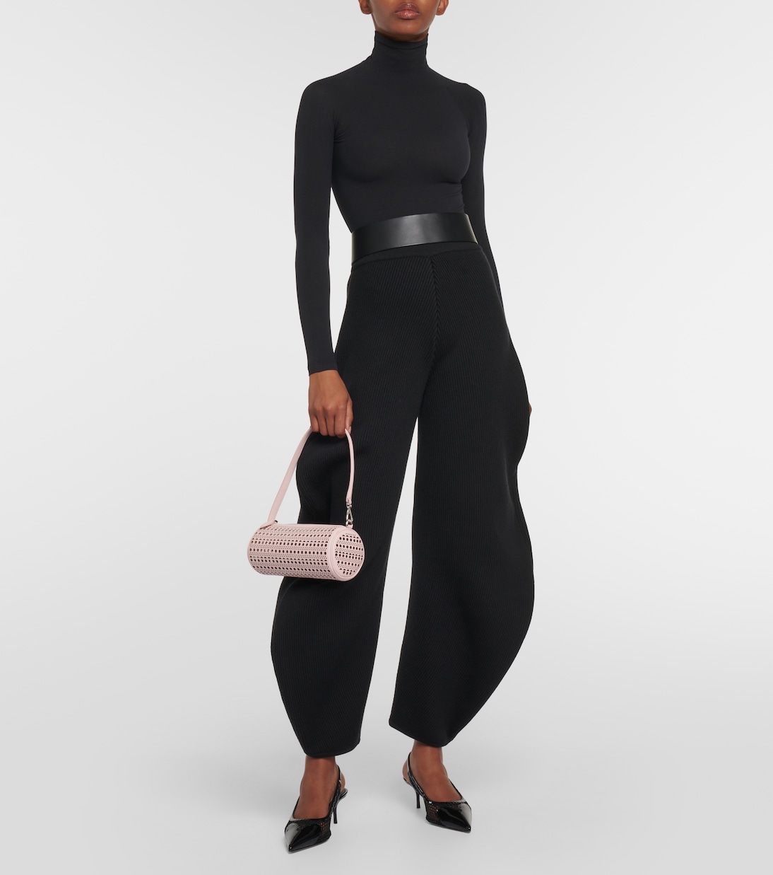 Tube perforated leather shoulder bag | Alaïa