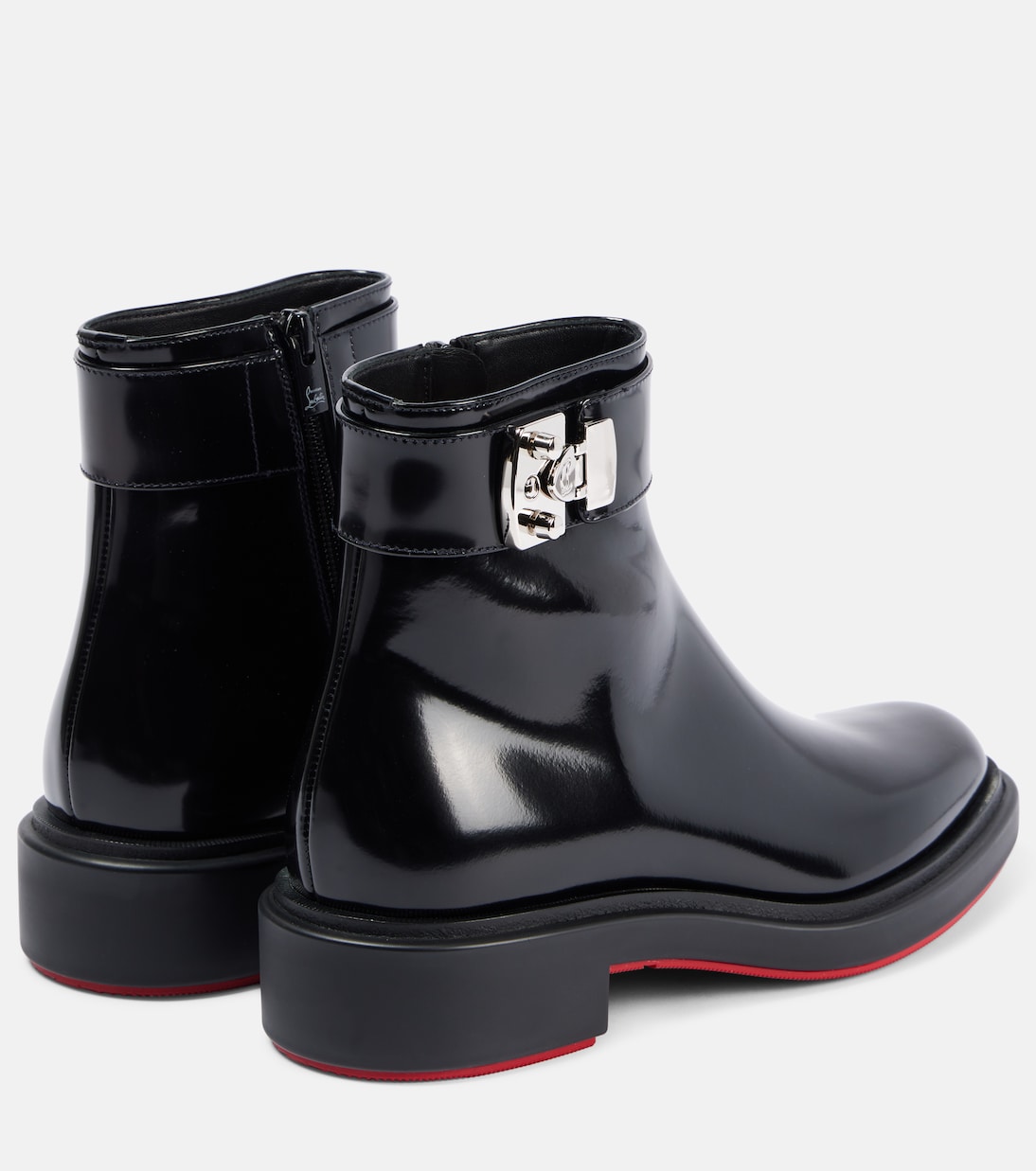 Stivaletti Urban Booty Lock in pelle lucida di Christian Louboutin per un look giovane e audace