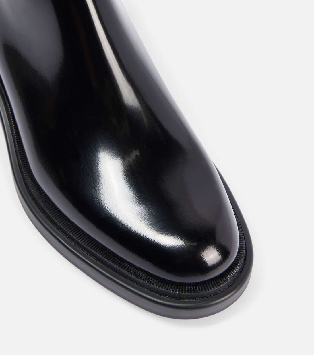 Stivaletti Urban Booty Lock in pelle lucida di Christian Louboutin per un look giovane e audace