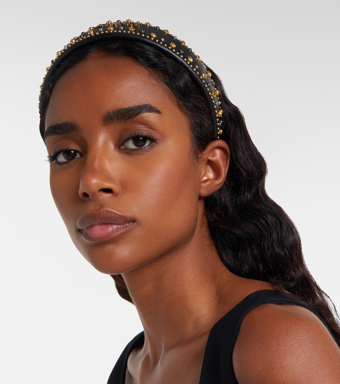 Logo embellished leather headband | Versace