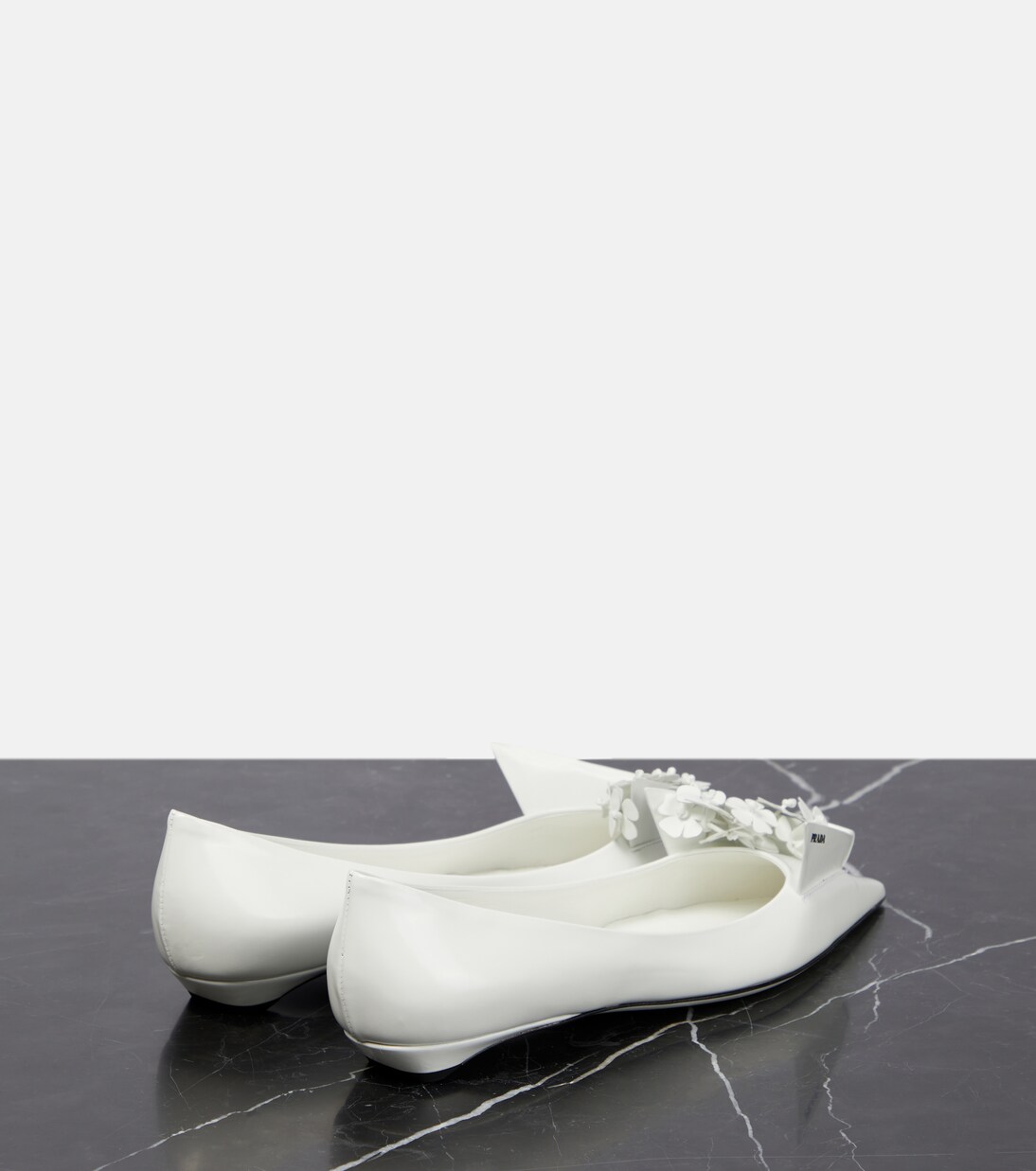 White flat pumps sales