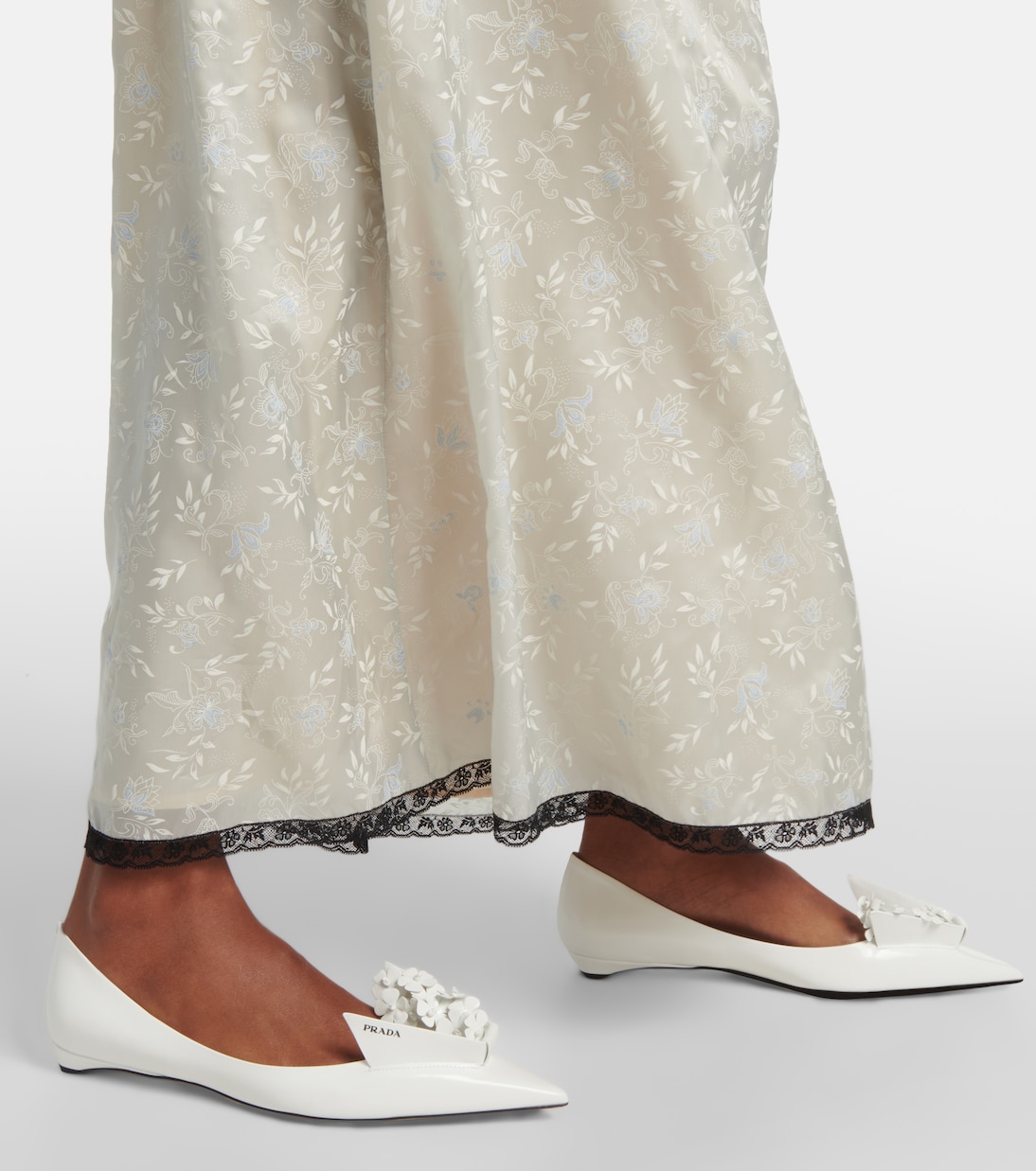 Embellished leather ballet flats in white Prada Mytheresa