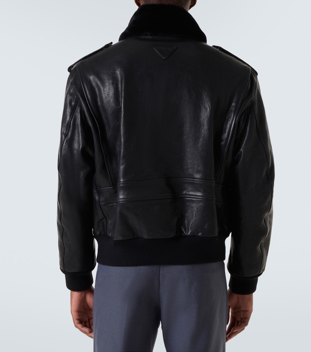 Faux fur-trimmed leather jacket | Prada