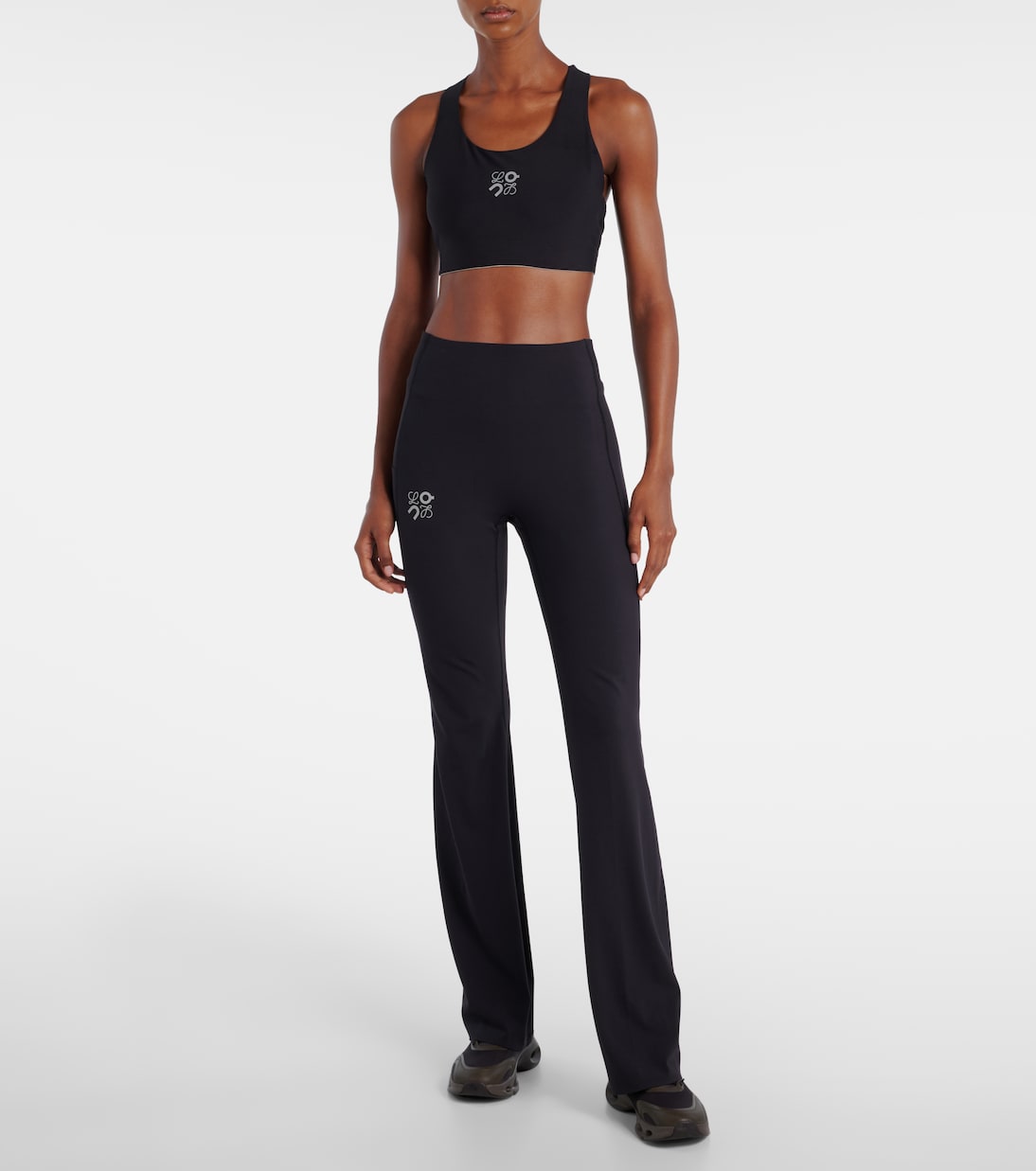 x On high-rise flared leggings | Loewe