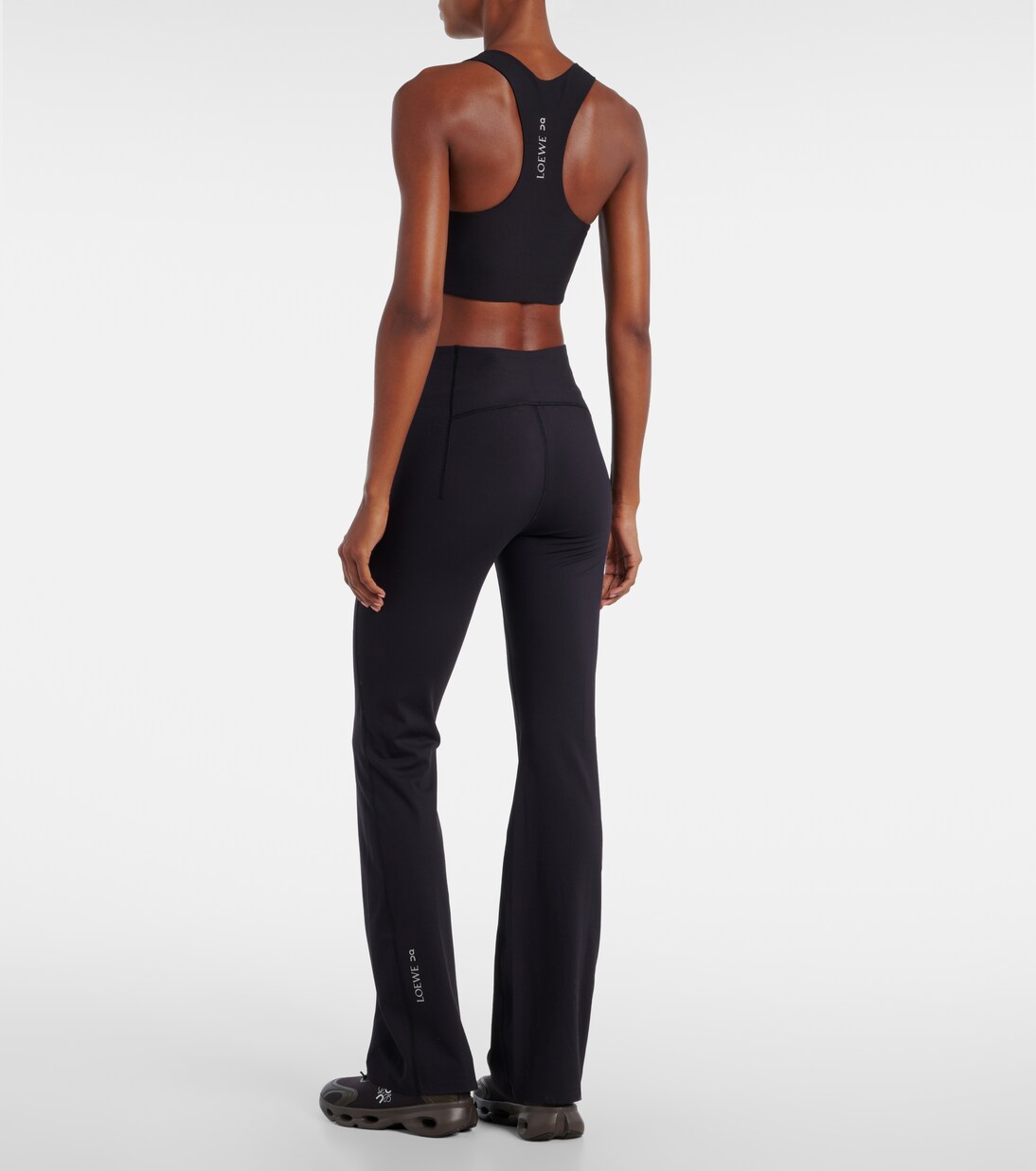 x On high-rise flared leggings | Loewe