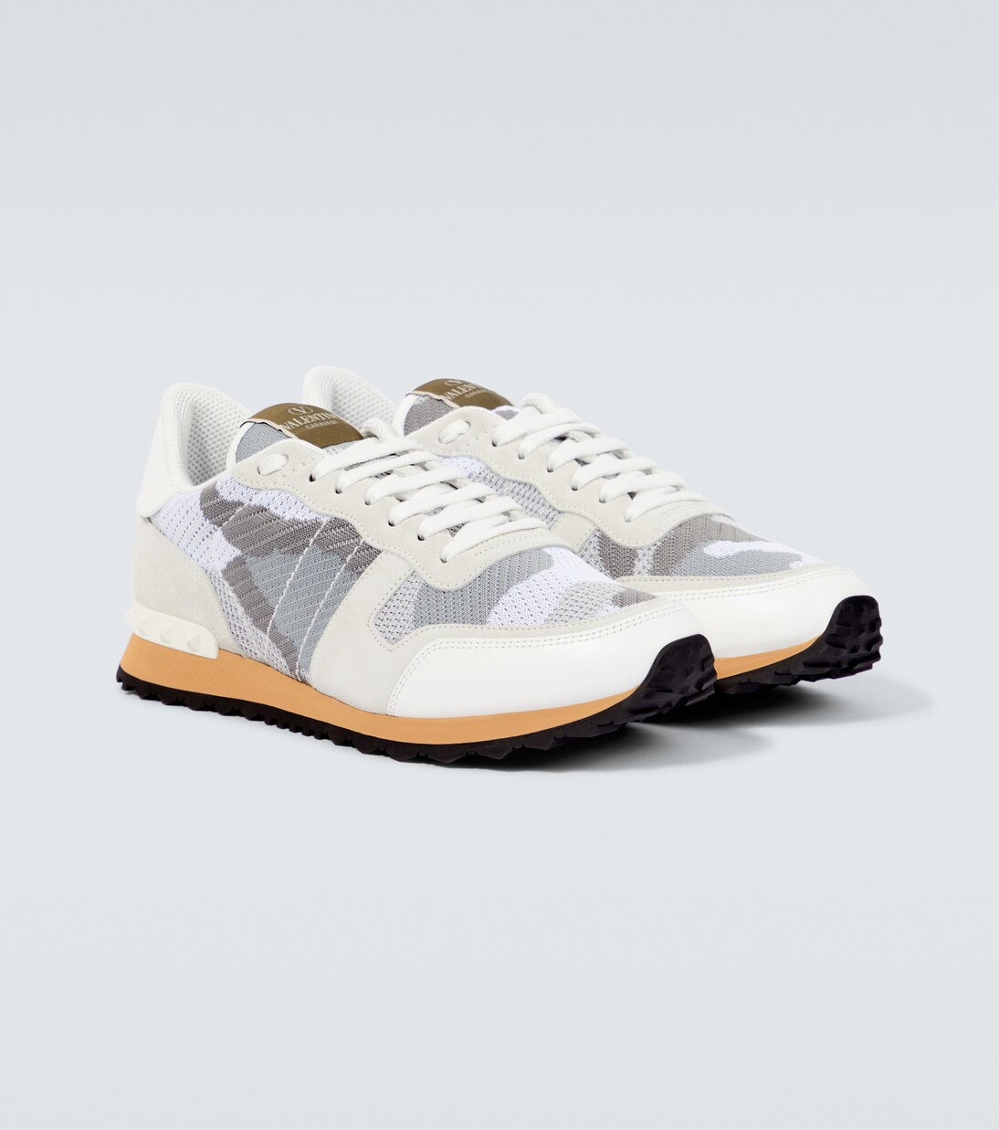 Rockrunner leather trimmed sneakers in white Valentino Garavani Mytheresa