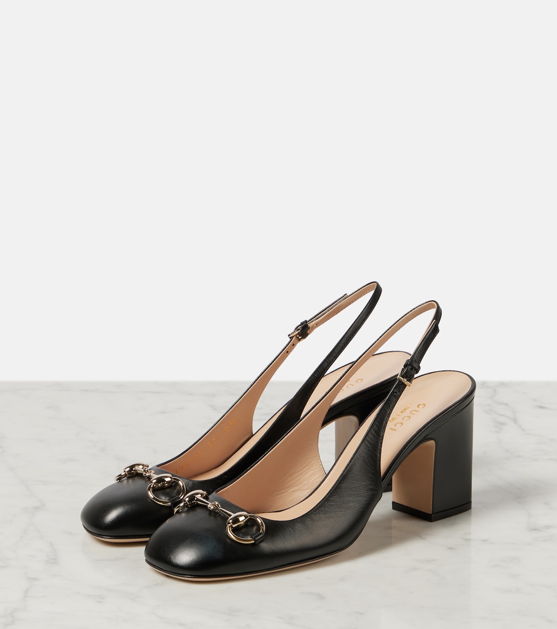 Horsebit leather slingback pumps | Gucci