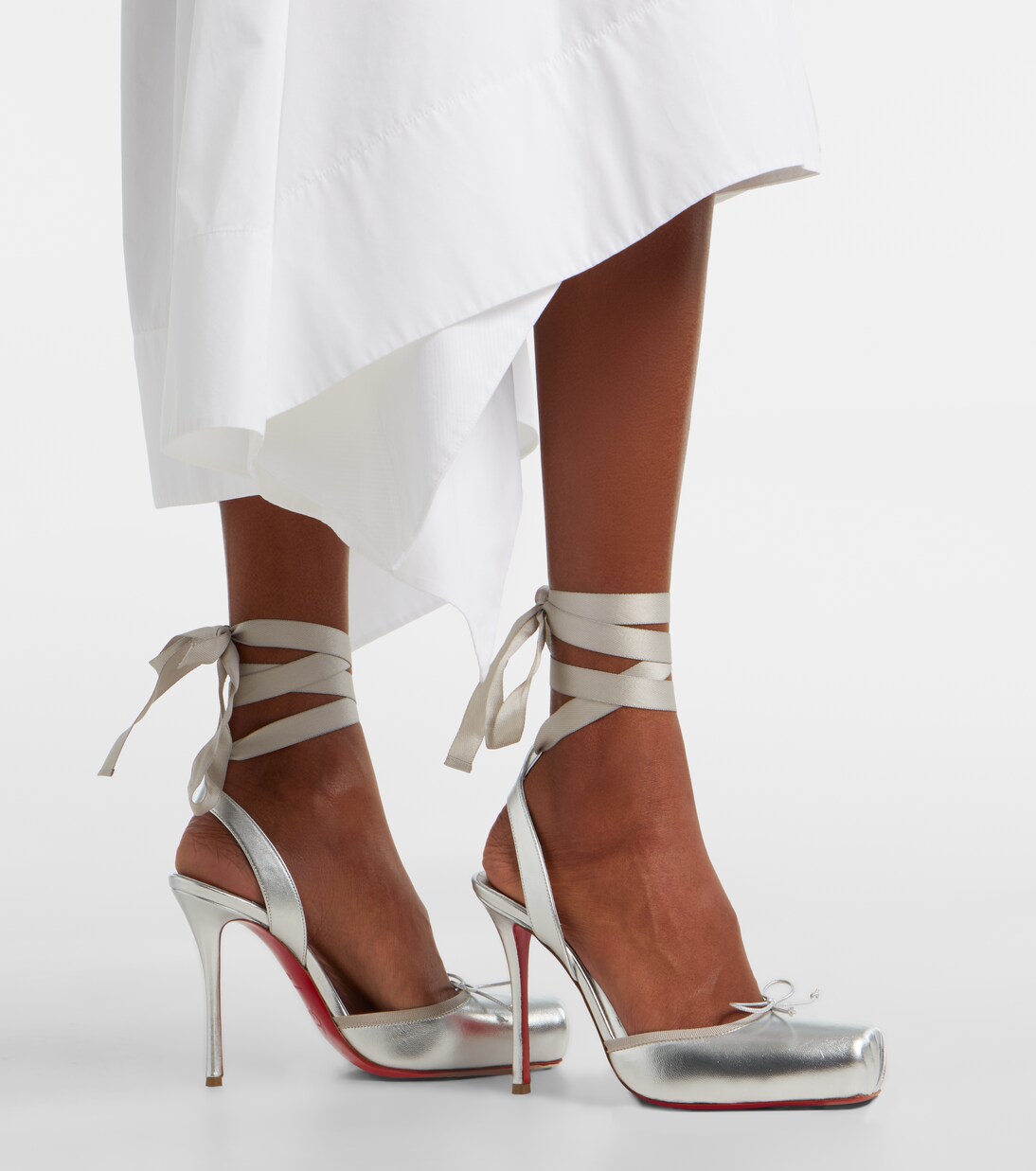 Salones destalonados Cassia 100 de piel metalizada | Christian Louboutin