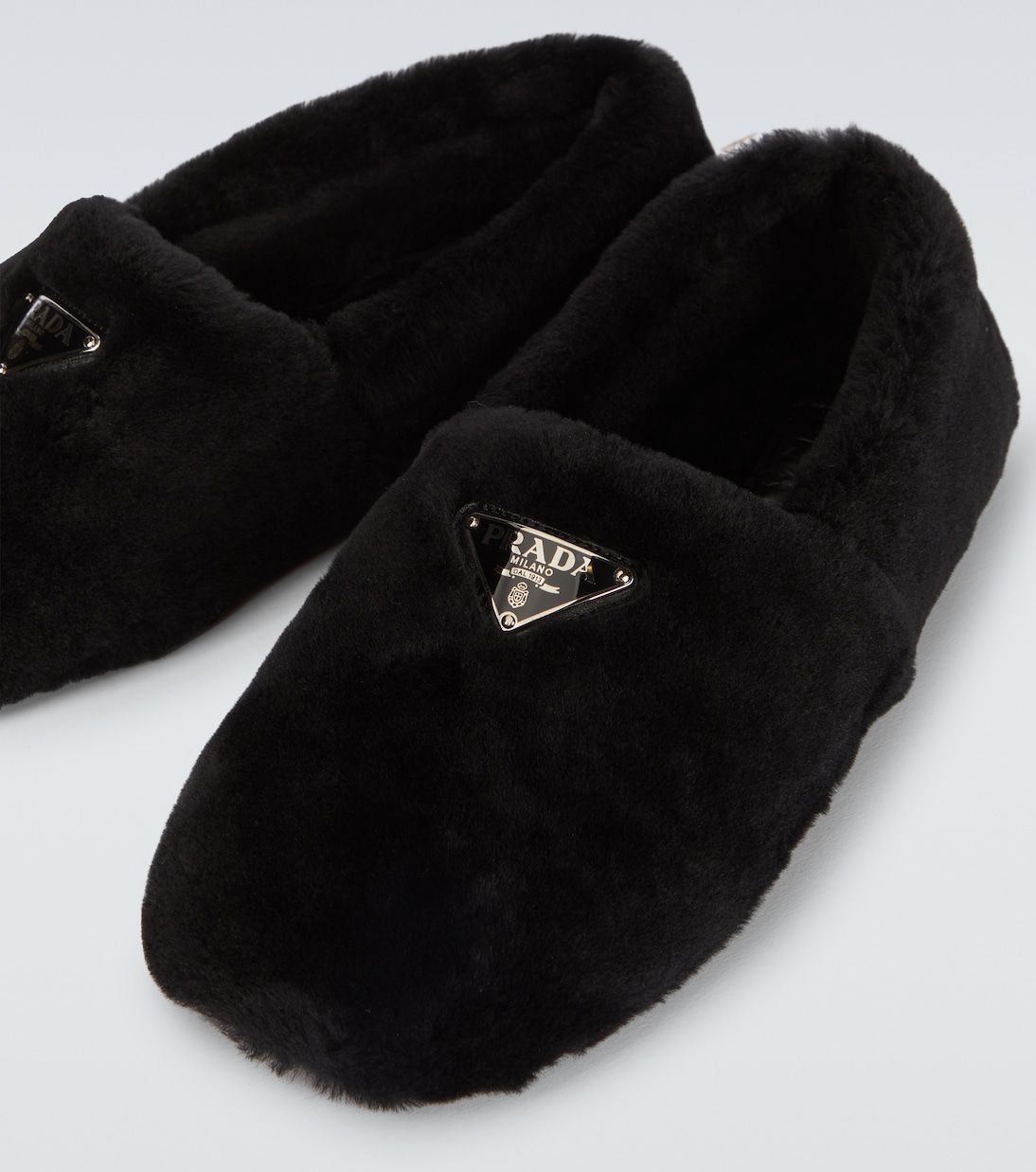 Slip-Ons aus Shearling | Prada