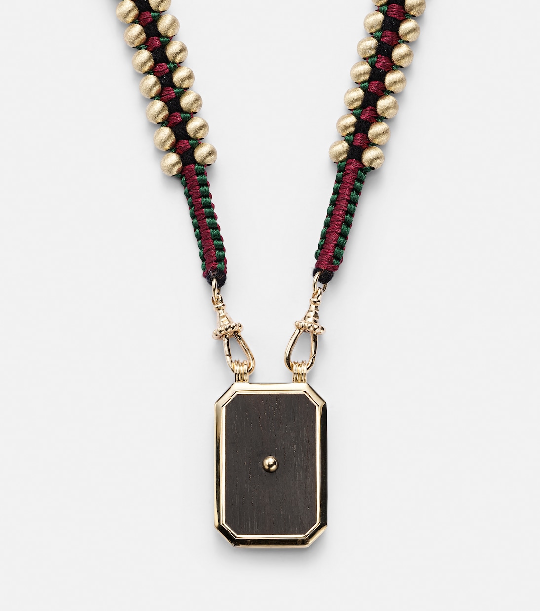 Collana con pendente in oro 18kt e ebano, design moderno Ebony Clover, dettaglio diamante, per stile giovane e audace.