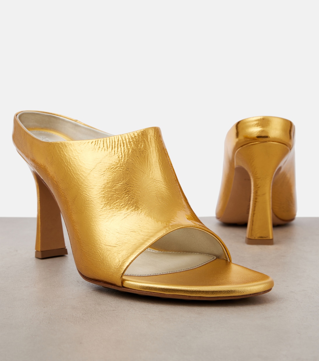 Mules Rana in pelle metallizzata | Bottega Veneta