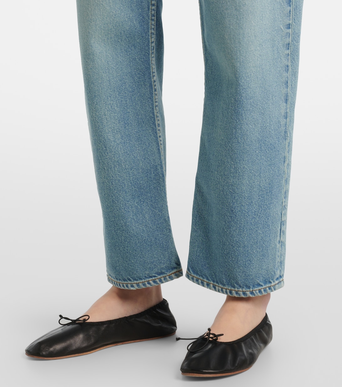 Riaco faded slim jeans | The Row