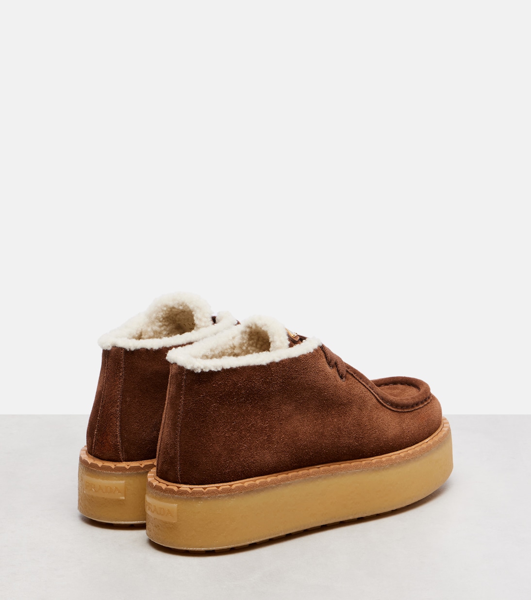 Shearling-trimmed suede desert boots | Prada