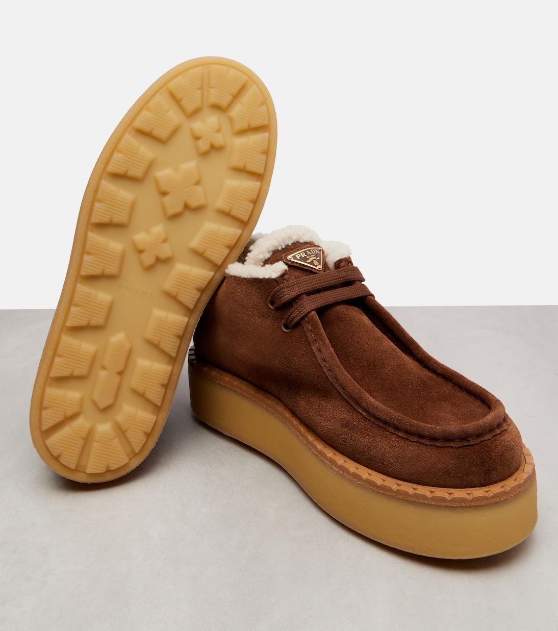 Shearling-trimmed suede desert boots | Prada