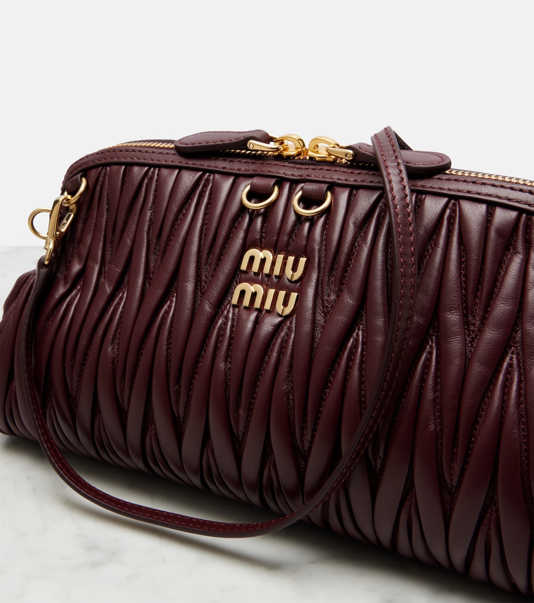 Matelassé leather clutch | Miu Miu