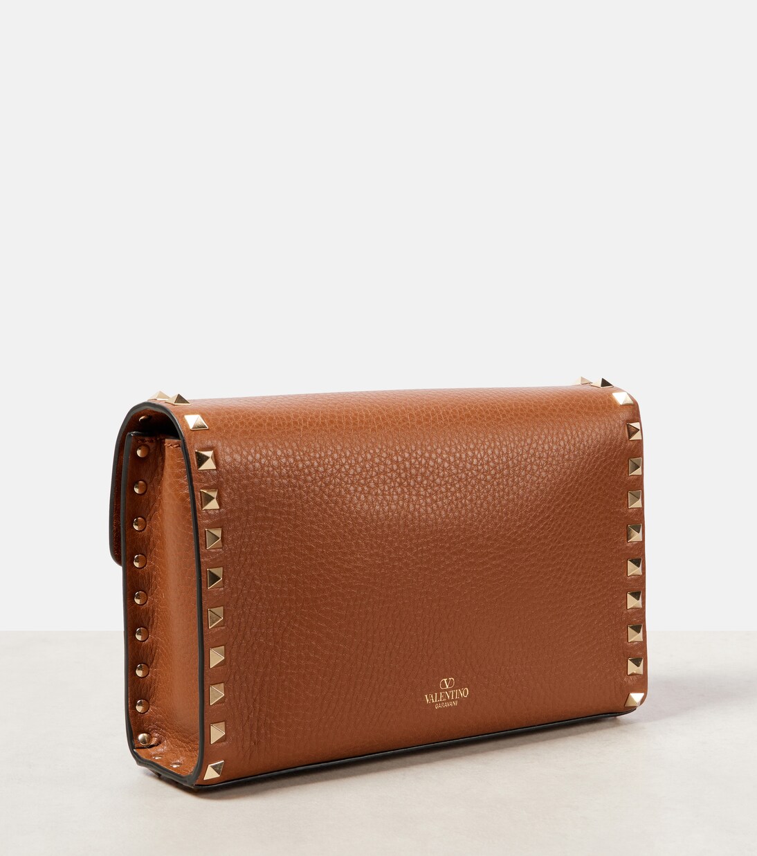 Rockstud Small leather crossbody bag in brown Valentino Garavani Mytheresa