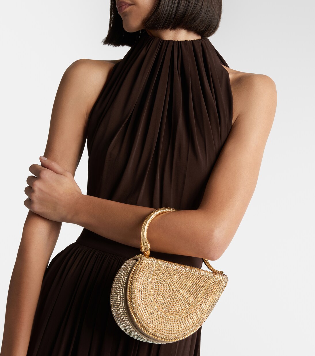 Serpentine Small embellished top-handle bag | Bvlgari