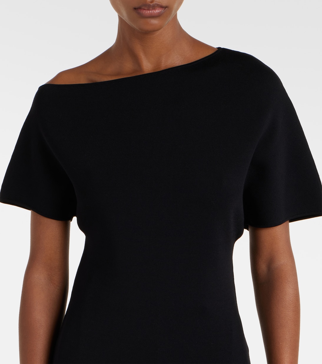 Top asymétrique | Róhe