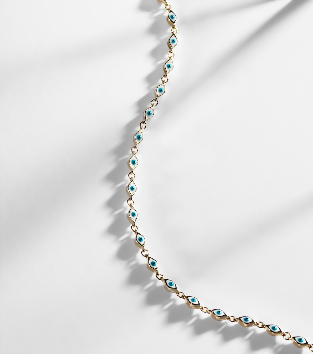 Braccialetto alla caviglia in oro 14kt con occhietto malocchio e smalti, design moderno per giovani