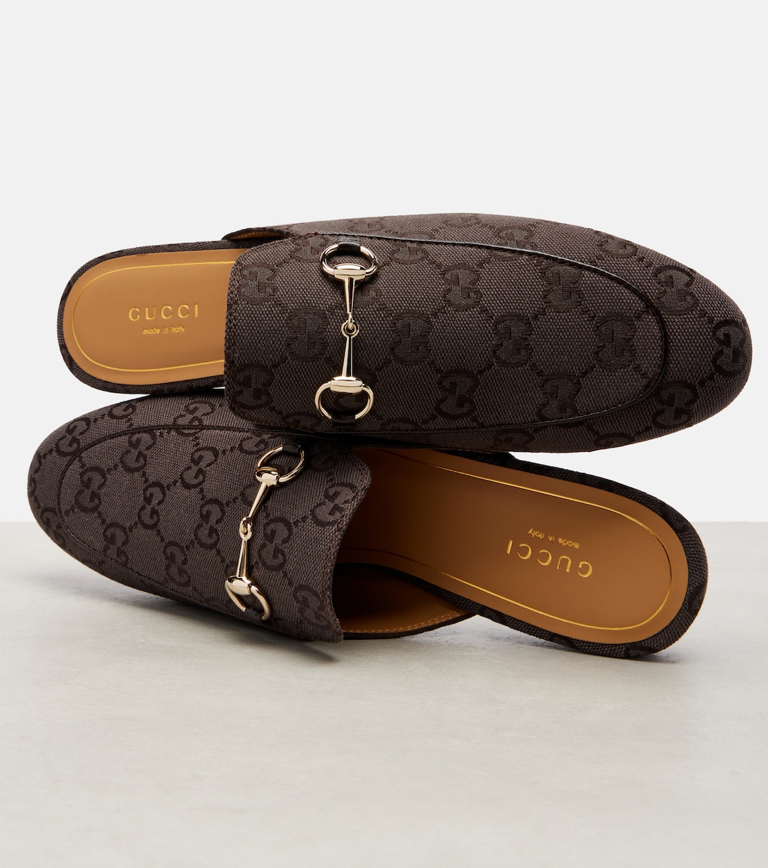 Mules Princetown de lona GG con Horsebit | Gucci