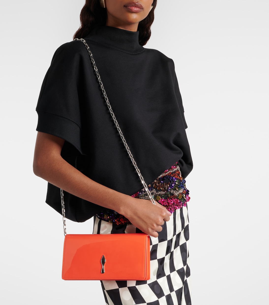 Bettina patent leather clutch | Christian Louboutin