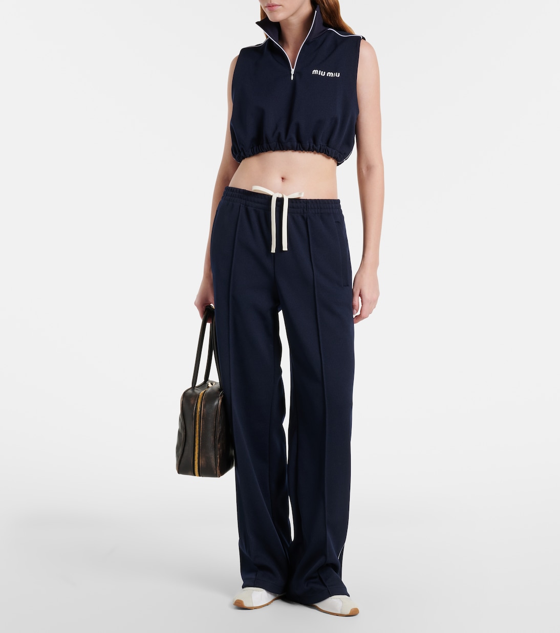 Plume suede-trimmed sneakers | Miu Miu