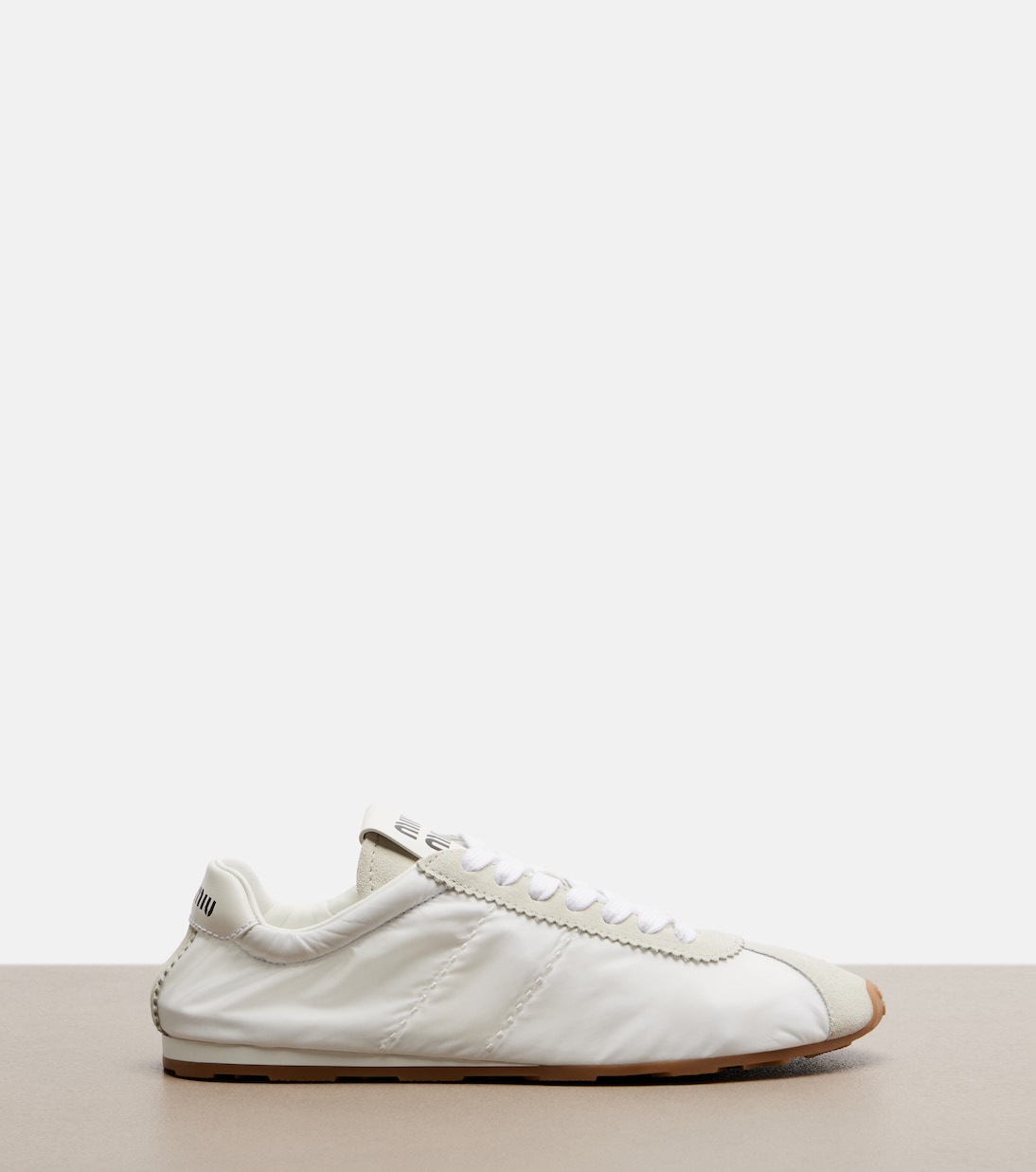 Plume suede-trimmed sneakers | Miu Miu