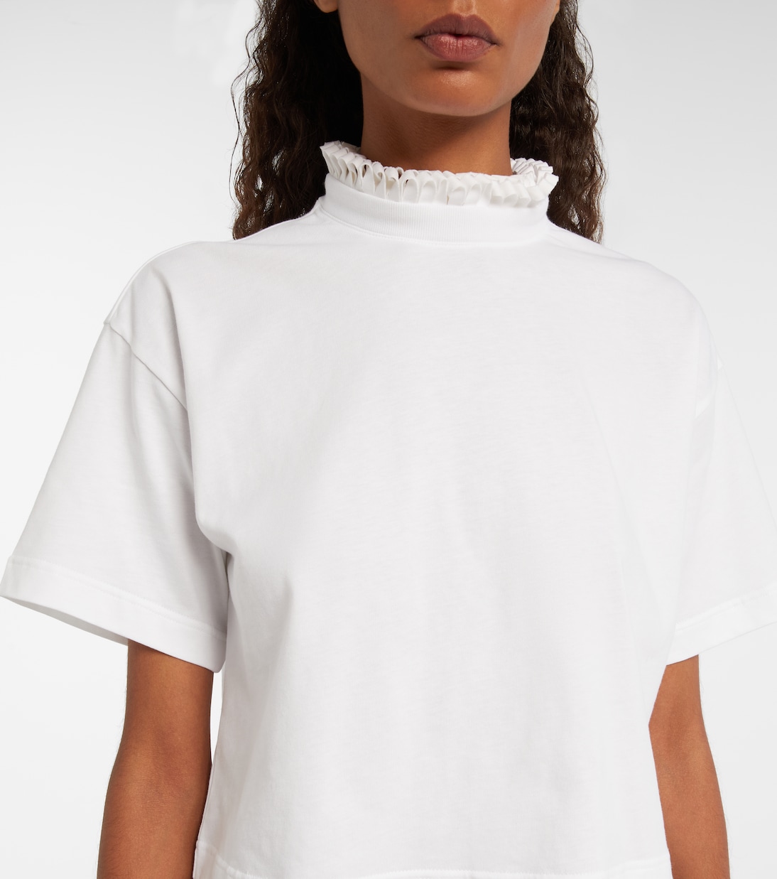 Cropped cotton jersey turtleneck top | Alaïa