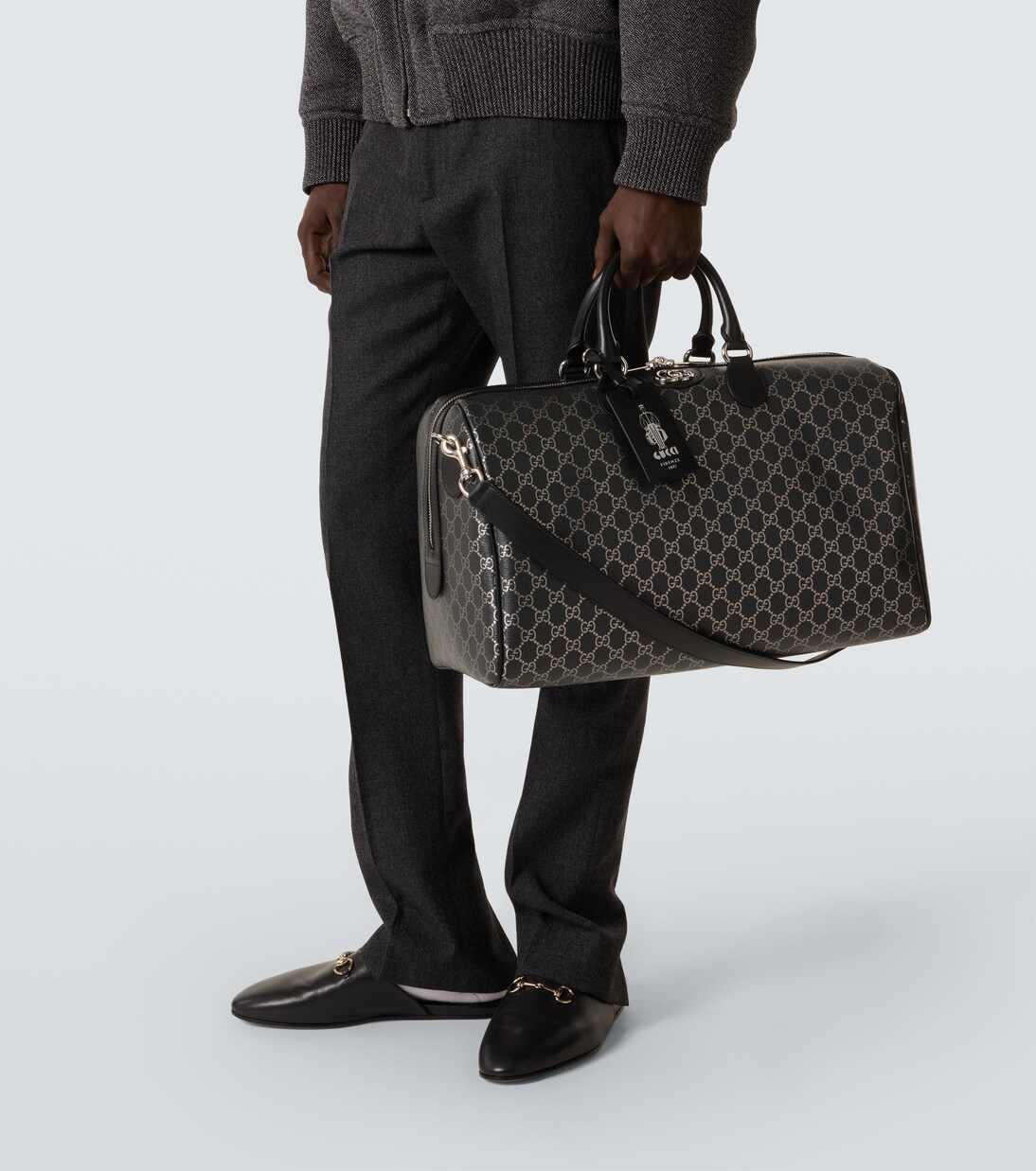 GG leather-trimmed duffel bag | Gucci