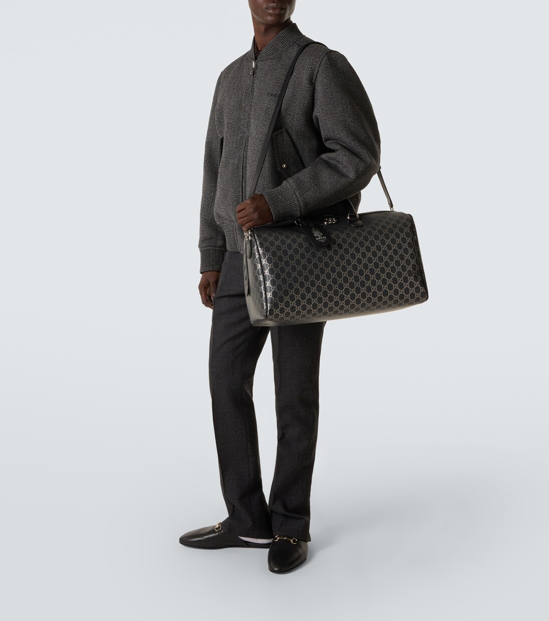 GG leather-trimmed duffel bag | Gucci