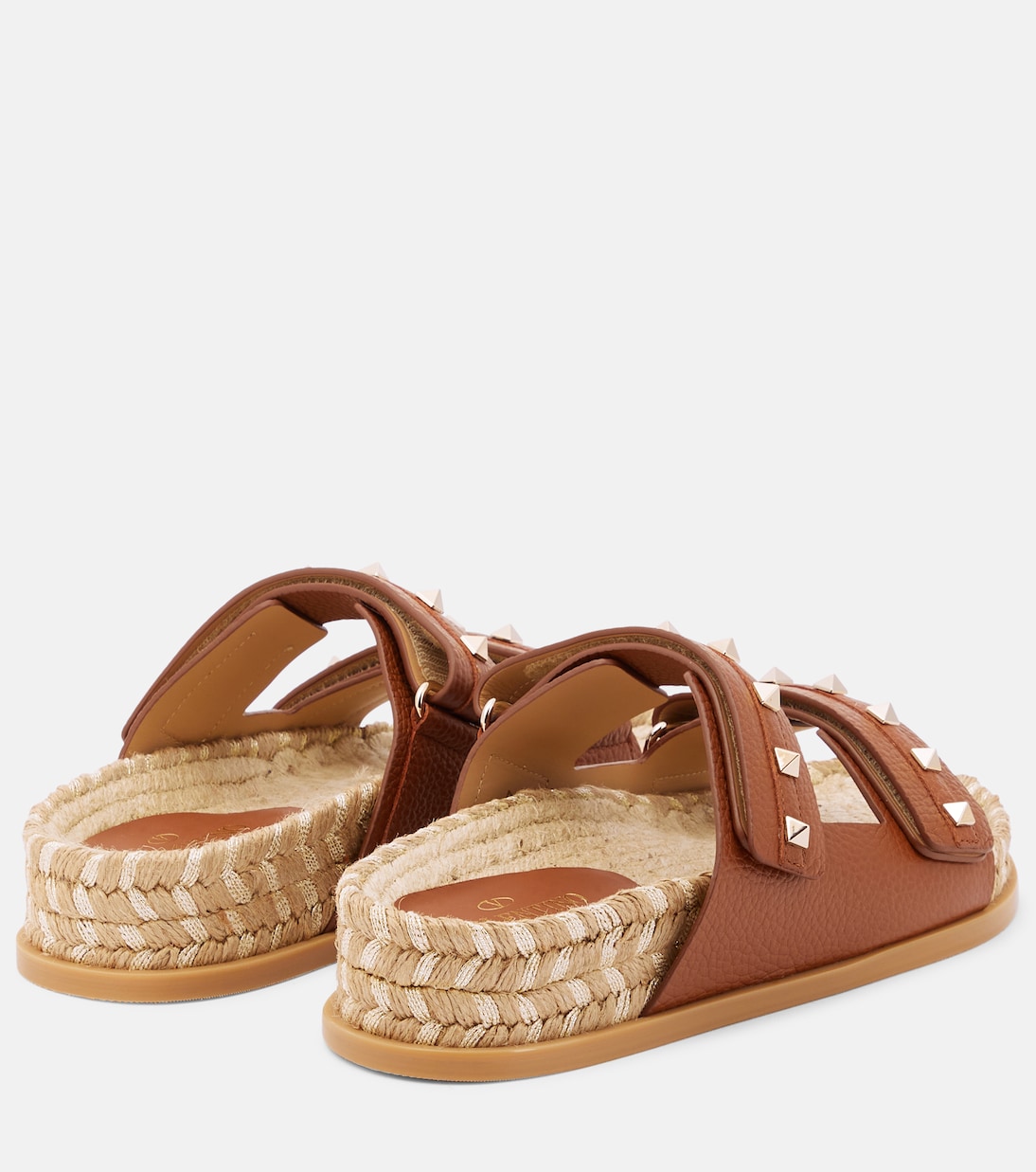 Rockstud leather and raffia slides | Valentino Garavani