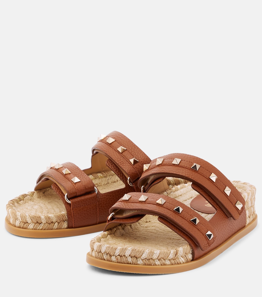 Rockstud leather and raffia slides | Valentino Garavani