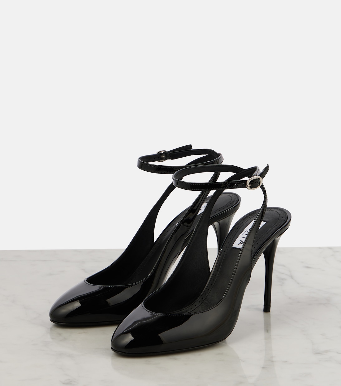 Escarpins Décolleté 90 en cuir verni | Alaïa
