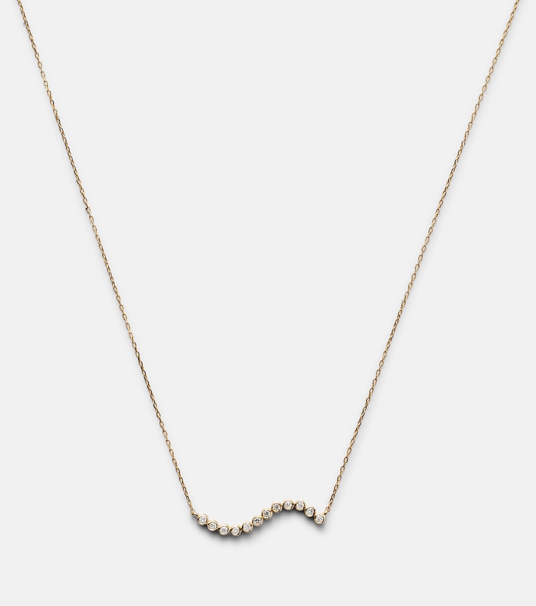 Collana in oro 14kt con design a onde e dettagli diamantati per uno stile giovane e raffinato