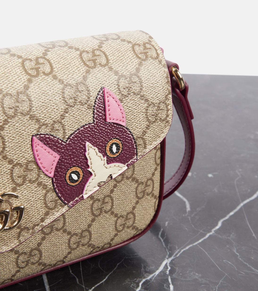 Borsa GG Mini in pelle con stampa | Gucci
