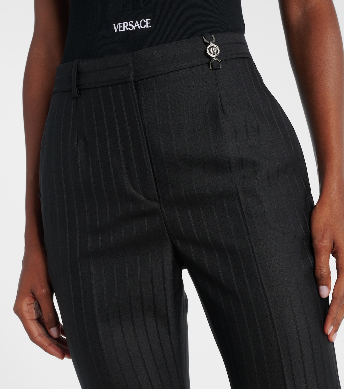 Embellished pinestripe wool flared pants | Versace