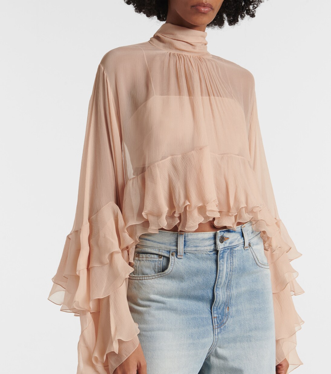 beige ruffle top