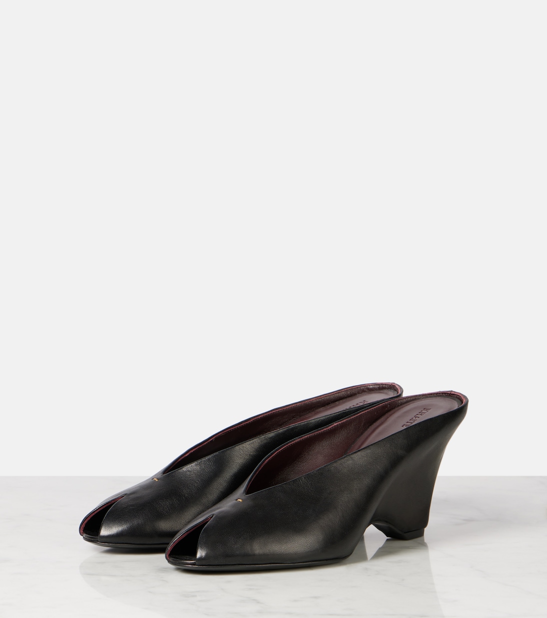 Cloak 75 leather peep-toe wedge mules | Khaite