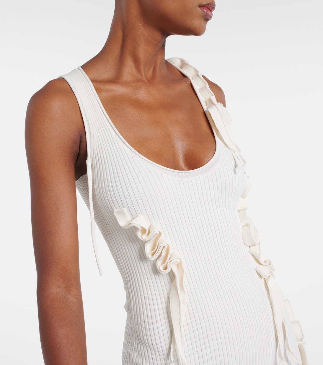 Abito lungo in maglia a coste con applicazioni floreali | Coperni