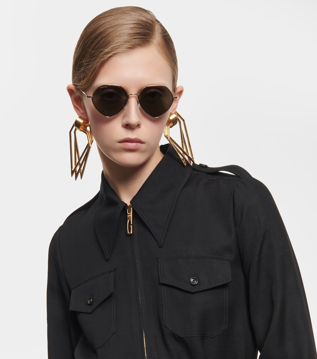 Occhiali da sole GUCCI con design geometrico per giovani alla moda
