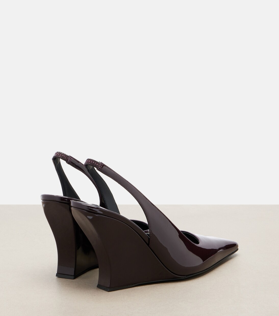 Patent leather wedge slingback pumps | Alaïa
