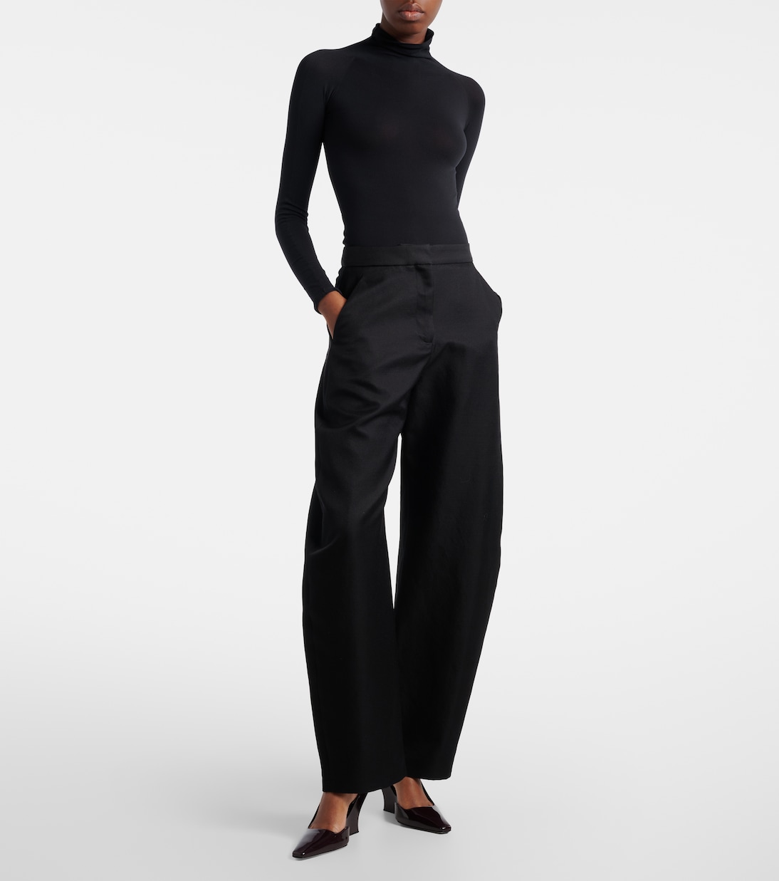 Patent leather wedge slingback pumps | Alaïa