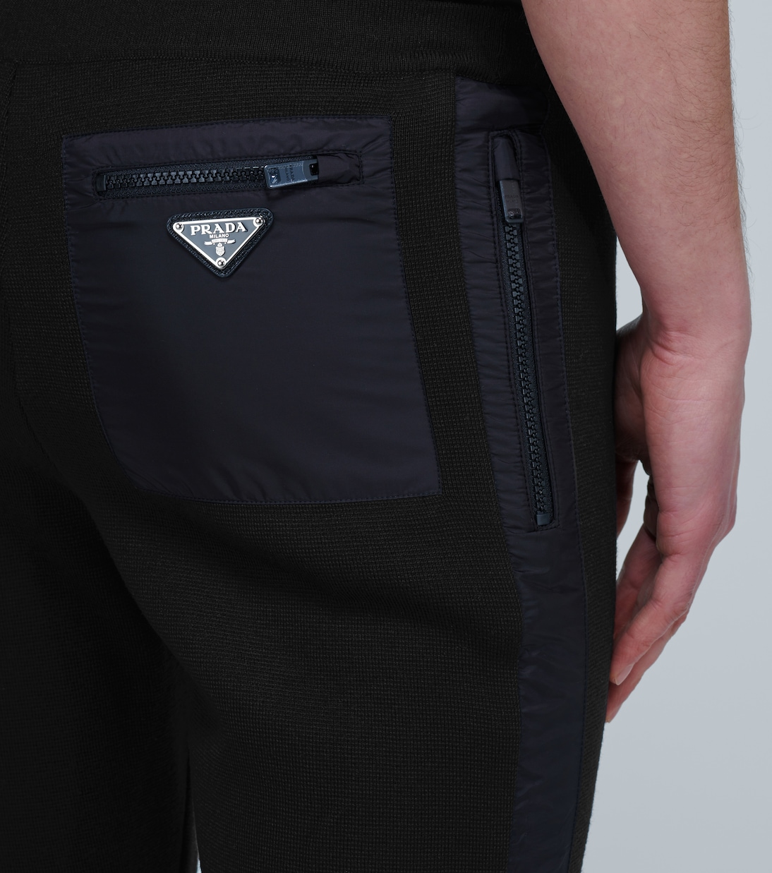 Leather-trimmed virgin wool sweatpants | Prada