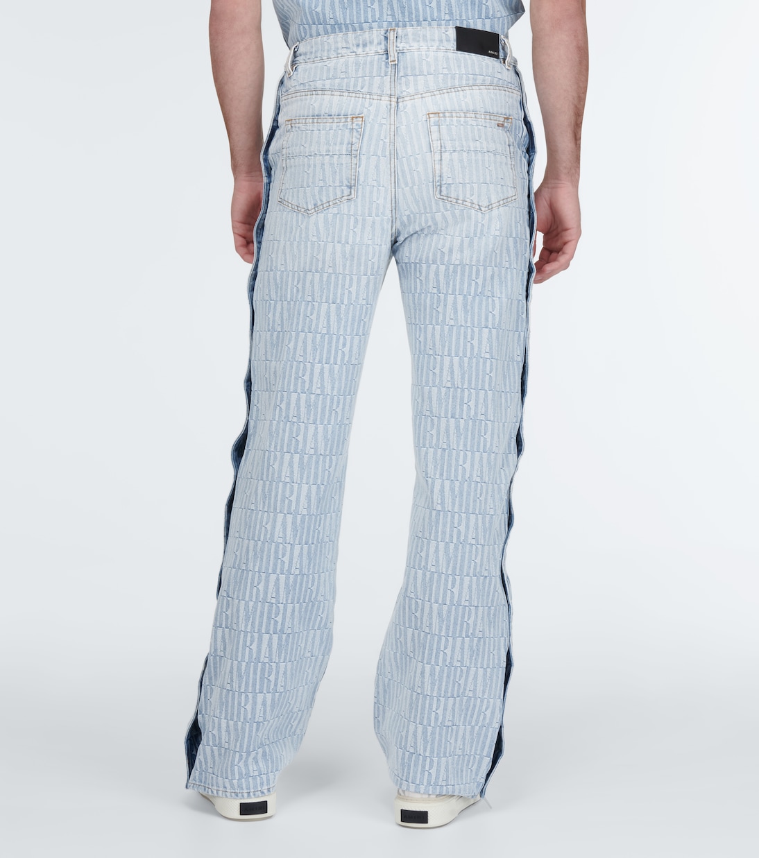 Pantalones denim en jacquard con logo | Amiri