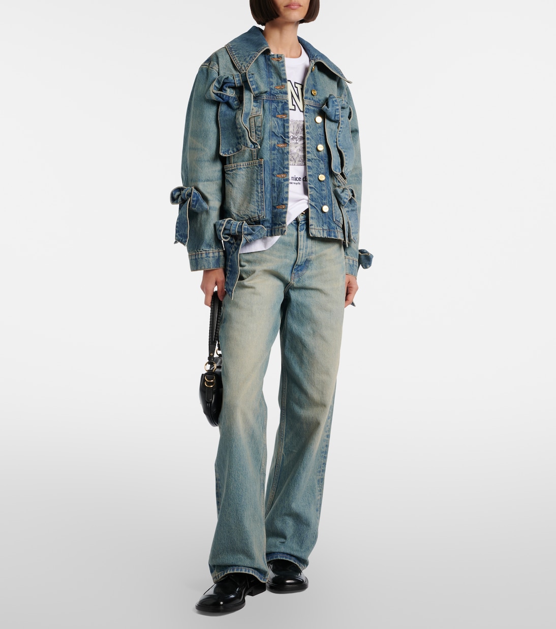 جاكيت من الدنيم بتفاصيل فيونكة | Ganni