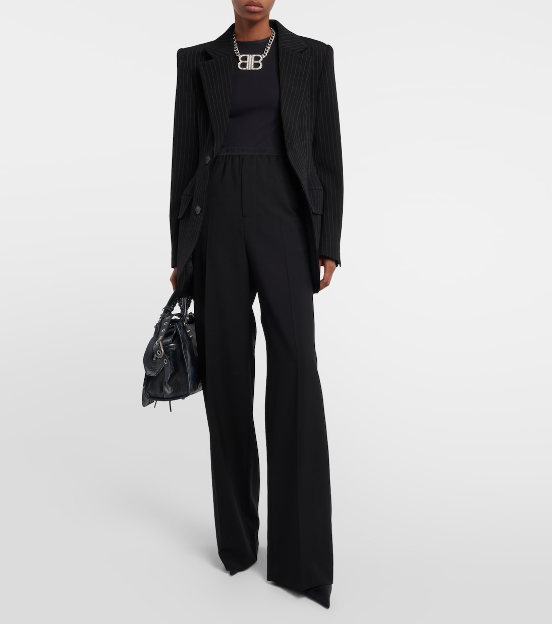 Pantalones Balenciaga de corte amplio y tiro medio en lana para jóvenes modernos