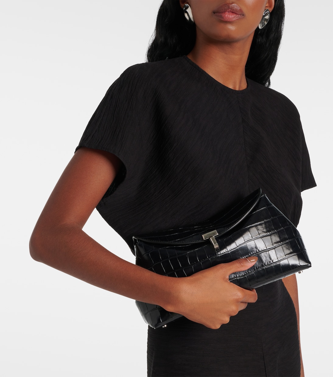 T-Lock croc-effect leather clutch | Toteme
