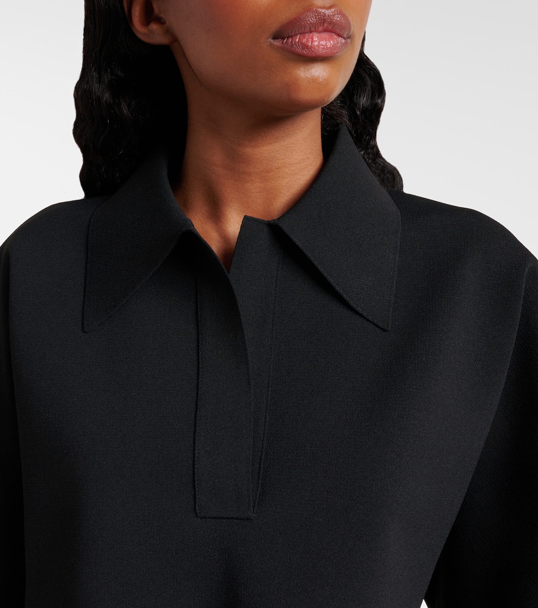 Cropped polo shirt in black - Alaia | Mytheresa