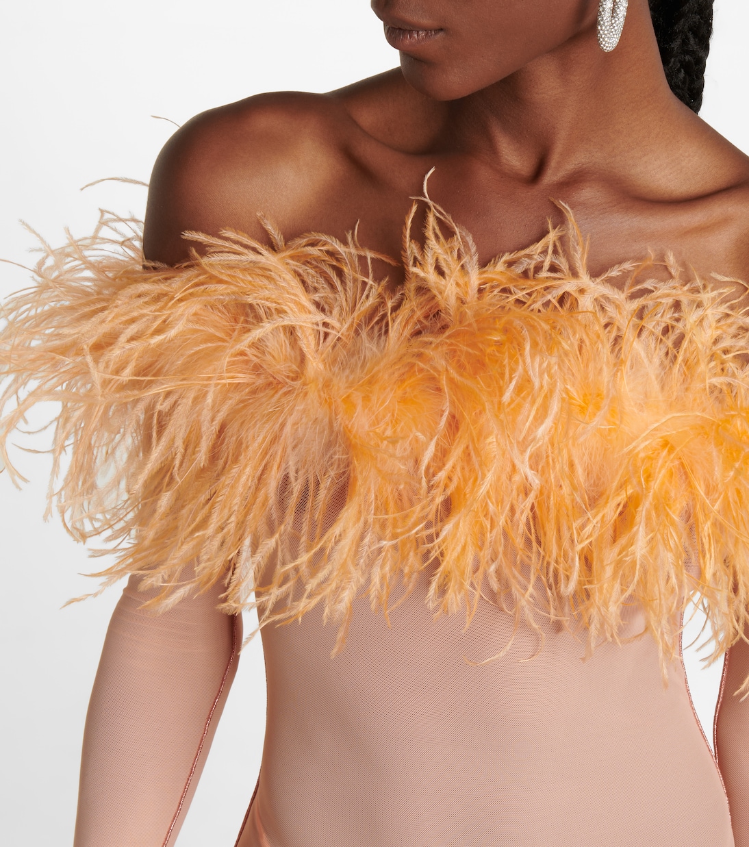 Mono de malla con plumas | Oséree