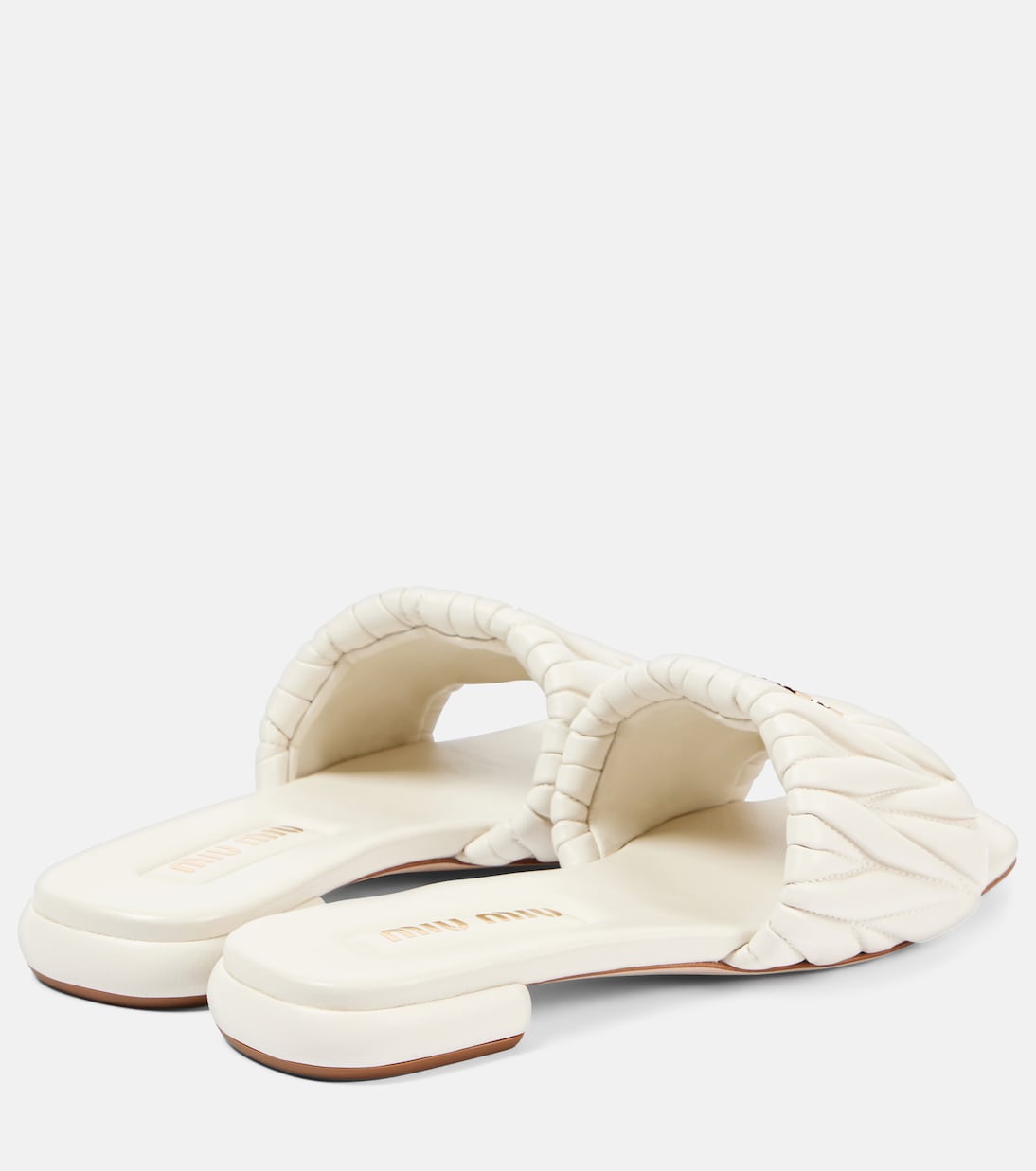 Scarpe slip-on in pelle traforata con logo MIU MIU, stile giovane e moderno